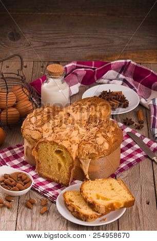 Easter Dove Bread (colomba Pasquale) On Wooden Table.