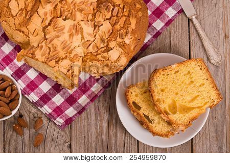 Easter Dove Bread (colomba Pasquale) On Wooden Table.