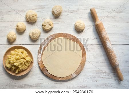 Cooking Traditional Pies With Potatoes. Placinta, Traditional Moldovan Pastries.