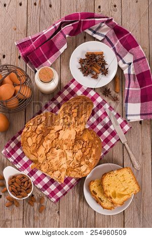 Easter Dove Bread (colomba Pasquale) On Wooden Table.