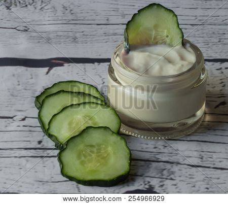 Cucumber Face Cream On White Wooden Background, Homemade Cosmetic