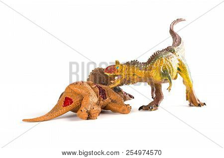 Carnotaurus With A Triceratops Body Nearby On White Background