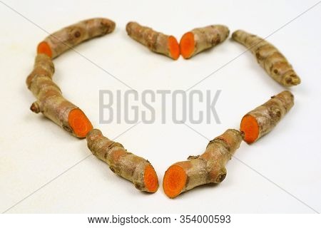 Fresh Turmeric Root Isolated On A White Background Is An Ingredient In Turmeric Foods And Ingredient
