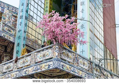 Dalat, Vietnam - April 15, 2019: Sakura Tree On The Balcony In A Buddism Pagoda With Porcelain Mosai