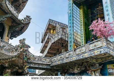 Dalat, Vietnam - April 15, 2019: Sakura Tree On The Balcony In A Buddism Pagoda With Porcelain Mosai