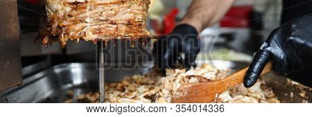 Close-up Meat On Special Equipment, Cook Shawarma. Modern Equipment For Street Trading. Opening Succ
