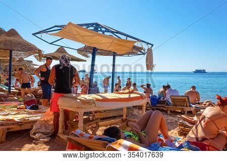 Sharm El Sheikh, Egypt - February 13, 2020: People Resting At El Fanar Beach In Egypt