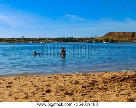 Sharm El Sheikh, Egypt - February 14, 2020: People Resting At Sand Beach Sharm El Maya In Egypt