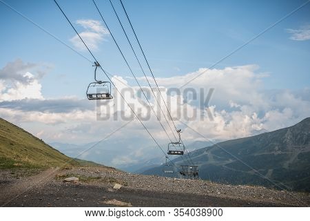 View Of The Pyrenees Mountains And Its Ski Lift On A Summer Day