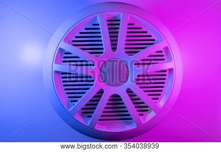 Colorful Lights Of Car Stereo And Car Speakers Background.  Car Music Audio Speaker In Blue And Pink