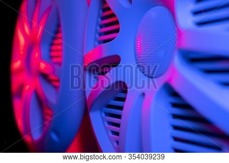 Colorful Lights Of Car Stereo And Car Speakers Background.  Car Music Audio Speaker In Blue And Pink