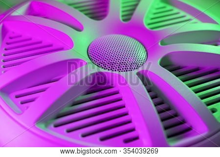 Colorful Lights Of Car Stereo And Car Speakers Background.  Car Music Audio Speaker In Green And Pin