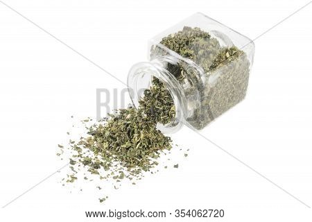 Dried Nettle Herb Or In Latin Utricae Folium In A Glass Jar Isolated On White Background. Medicinal 