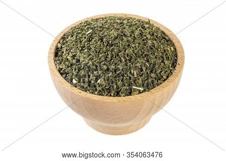 Dried Nettle Herb Or In Latin Utricae Folium In Wooden Bowl Isolated On White Background. Medicinal 