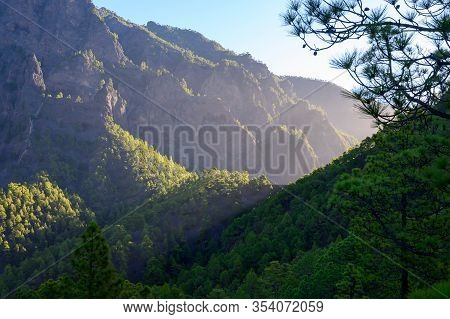 Scenic View On Caldera De Taburiente With Green Pine Forest, Ravines And Rocky Mountains Near Viewpo