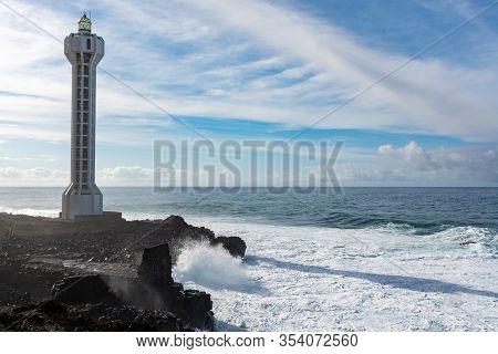 Dangerious Ocean Stormy Waves Hits Black Lava Rocks By Faro De Las Hoyas, La Palma Island, Canary, S