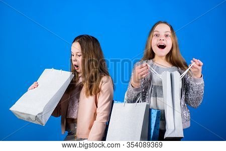Sales And Discounts. Small Girls With Shopping Bags. Sisterhood And Family. Savings On Purchases. Ha