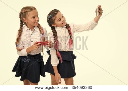 Nurturing Your Blog Culture. Little Schoolchildren Making Selfie For New Blog Isolated On White. Sma