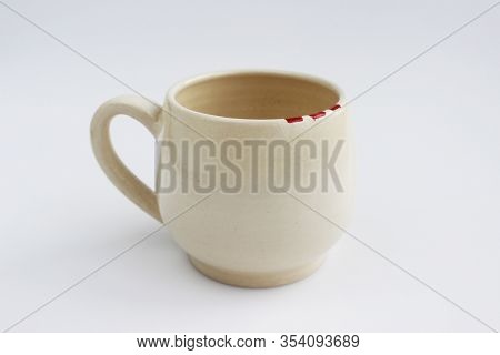 Ceramic Mug With Red Spots Painted With Overglaze Paint. Handmade.