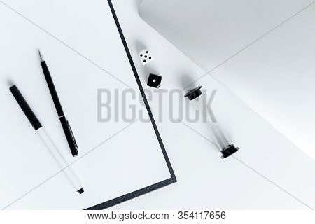 Coaching Business Tools Like Hourglass, Notebok, Dice, Pens And Tablet On A White Background. Flat L