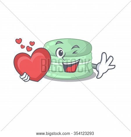 Romantic Pistachio Macaron Cartoon Picture Holding A Heart