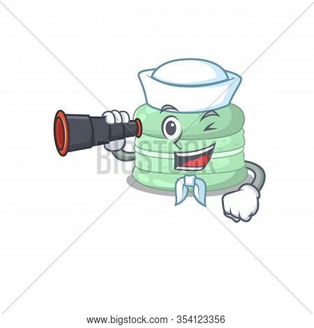 A Picture Of Pistachio Macaron Working As A Sailor With Binocular