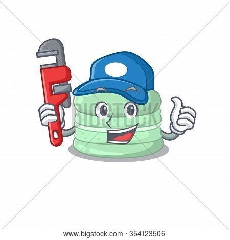 A Cute Picture Of Pistachio Macaron Working As A Plumber