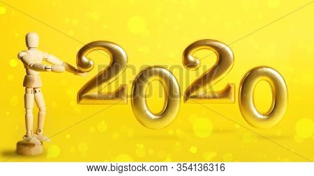 Wooden Human Holding 2020 Figures.new Year Concept.organic Design.