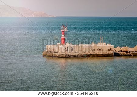 Red Flap Gate Lighthouse In The Port Of Caucasus.