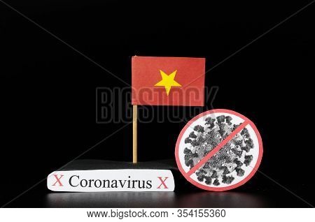National Flag Of Vietnam With Cell Of Covid-19 And Word Coronavirus. Fast Spreading Disease Worldwid