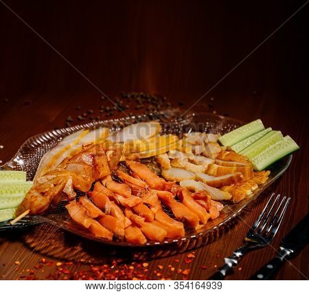 Fish Appetizer Of Dried Fish Pieces On A Plate