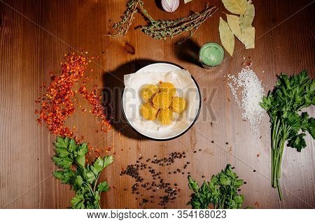 Potato Croquette Balls With Sauce On A Plate.top View