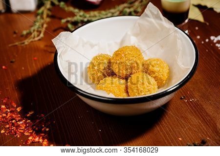 Potato Croquette Balls With Sauce On A Plate.