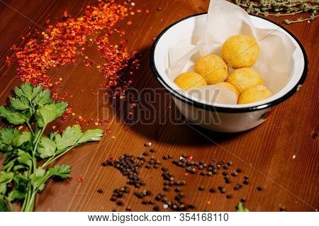 Potato Croquette Balls With Sauce On A Plate.