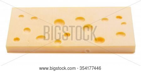 Portion (block) Of Emmental Swiss Cheese. Texture Of Holes And Alveoli. Isolated On White Background