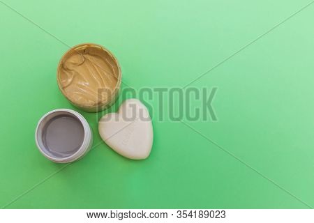 Cosmetic Cream, Scrub And Heart-shaped Soap Top View