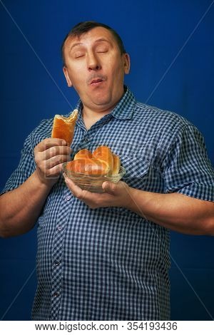 Portrait Hungry Person. Brutal Appetite. Anticipation Tasty Lunch. National Dish Pies With A Stuffin