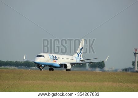 Amsterdam, The Netherlands  -  June 2nd, 2017: G-fbjc Flybe Embraer Erj-175std Taking Off From Polde