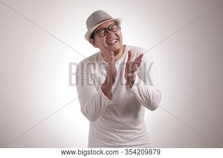 Happy Young Man Clapping Hands