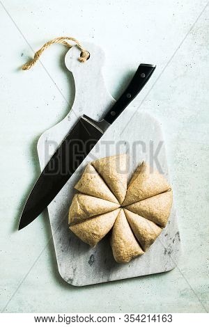 Cooking Dough For Pita Bread On A Table In A Glass Bowl, Rolling Pin And Knife