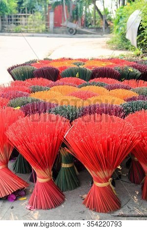 Bouquets Of Colorful Incense Sticks Placed To Get Dry In The Sun In Hoi An, Vietnam