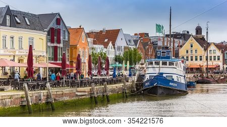 Husum, Germany - June 27, 2019: Panorama Of A Boat At The Quayside Of The Old Harbor In Husum, Germa
