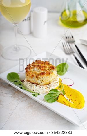 Gourmet Plated Fishcake Or Crabcake With Vegetable Puree, Restaurant Food