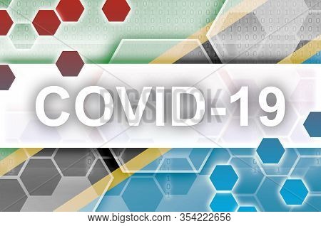 Tanzania Flag And Futuristic Digital Abstract Composition With Covid-19 Inscription. Coronavirus Out
