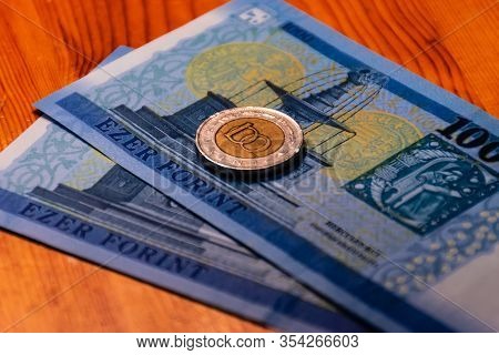 A Close-up Shot Of Hungarian National Currency (forint) Banknotes And A 100 Forint Coin
