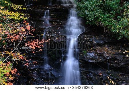 Refreshing Waterfall Hidden Deep In The Autumn Forest