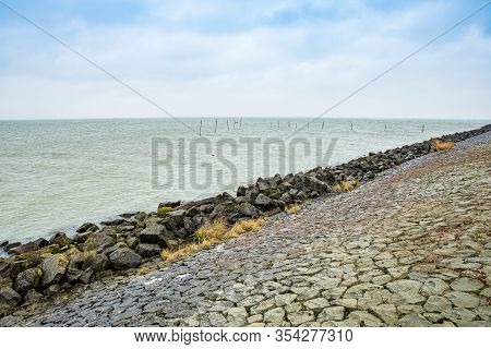 Stony Embankment By The Coast Of Markermeer Near Almere In Netherlands