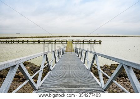Pier In Markermeer By The Road N701 Between Almere And Lelystad In Netherlands