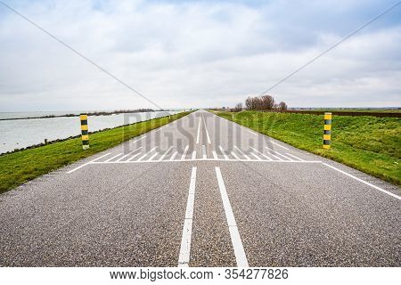 The Road N701 Between Almere And Lelystad In Netherlands Splitting Nature Reservation And Markermeer
