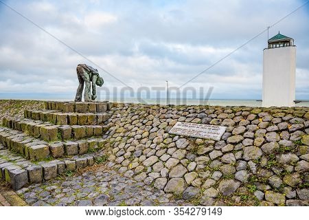 Den Oever, Netherlands - January 09, 2020. Statue And Look Out Tower By The Highway A7
